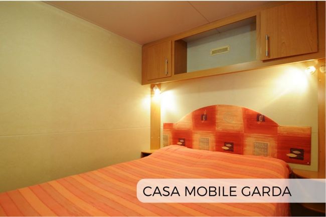 Camera da letto di una casa mobile del Centro Vacanze Mirage